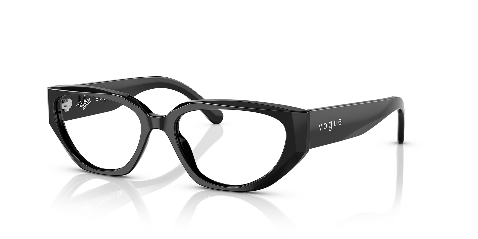 A pair of black glasses with clear lenses on a white surface.