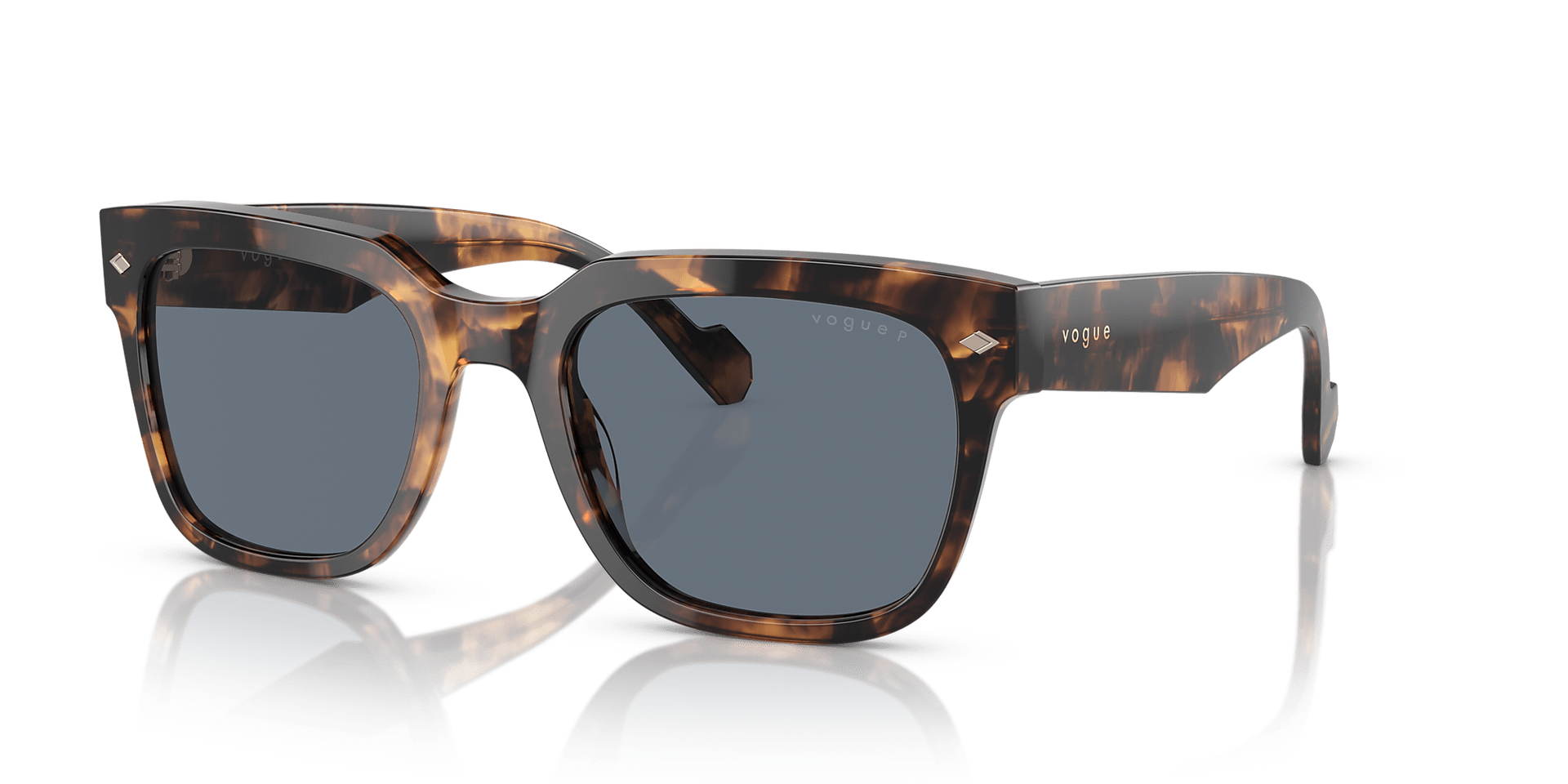 A pair of sunglasses are sitting on a white surface.