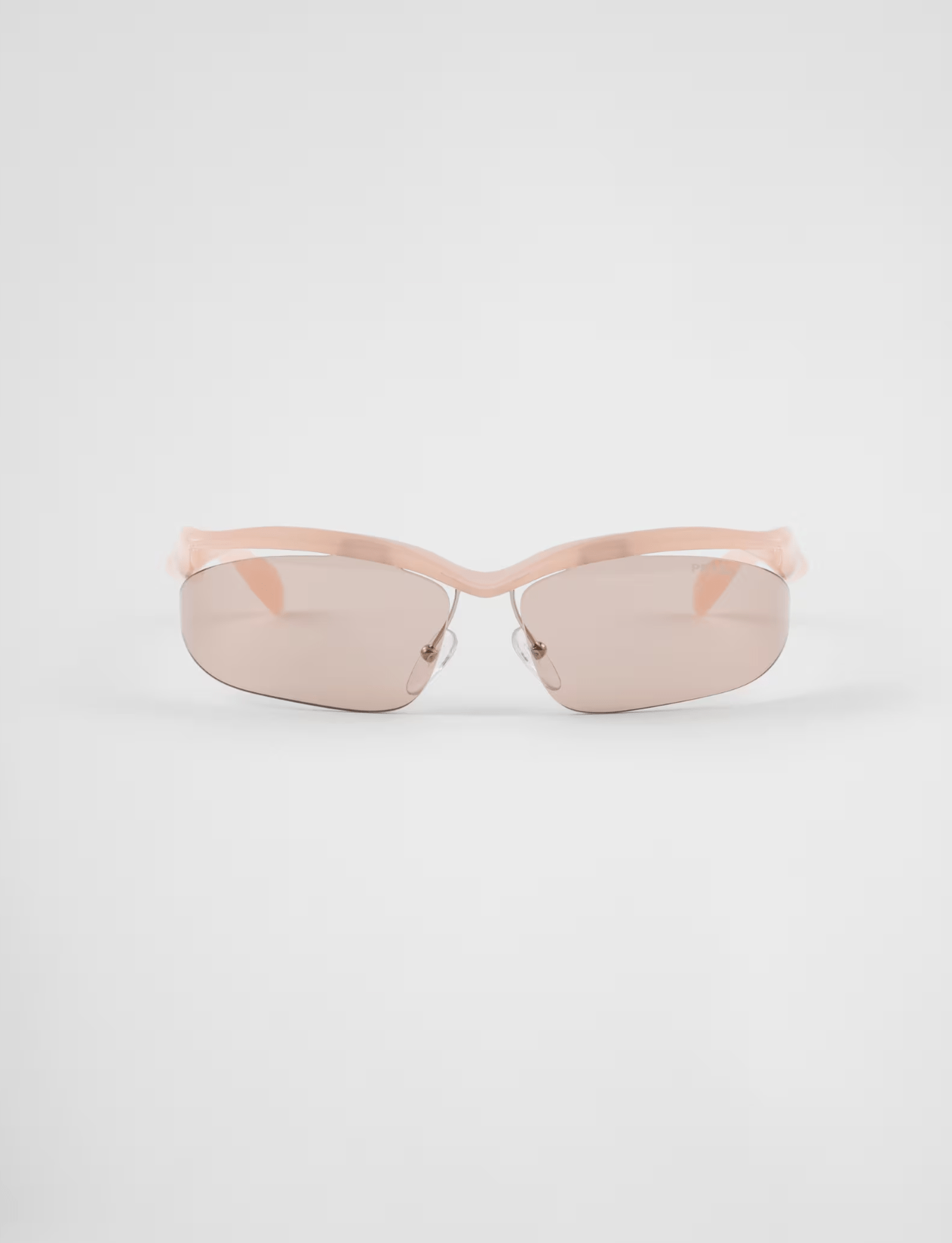 A pair of pink sunglasses on a white background.