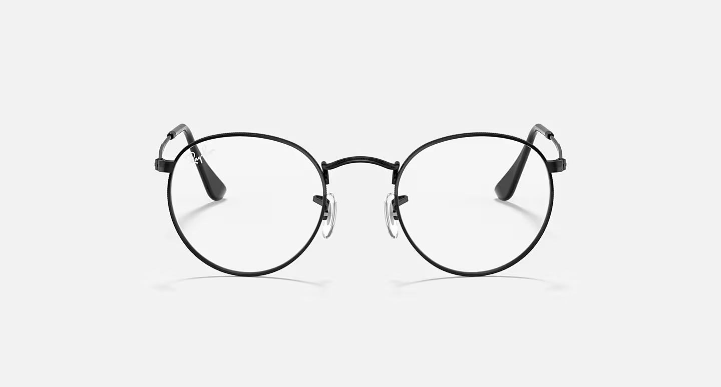 A pair of round glasses on a white background.