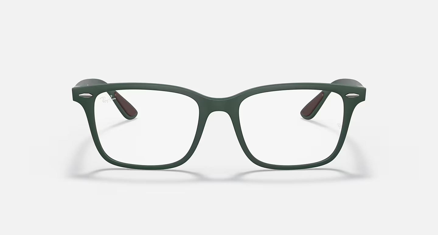 A pair of green glasses on a white background.