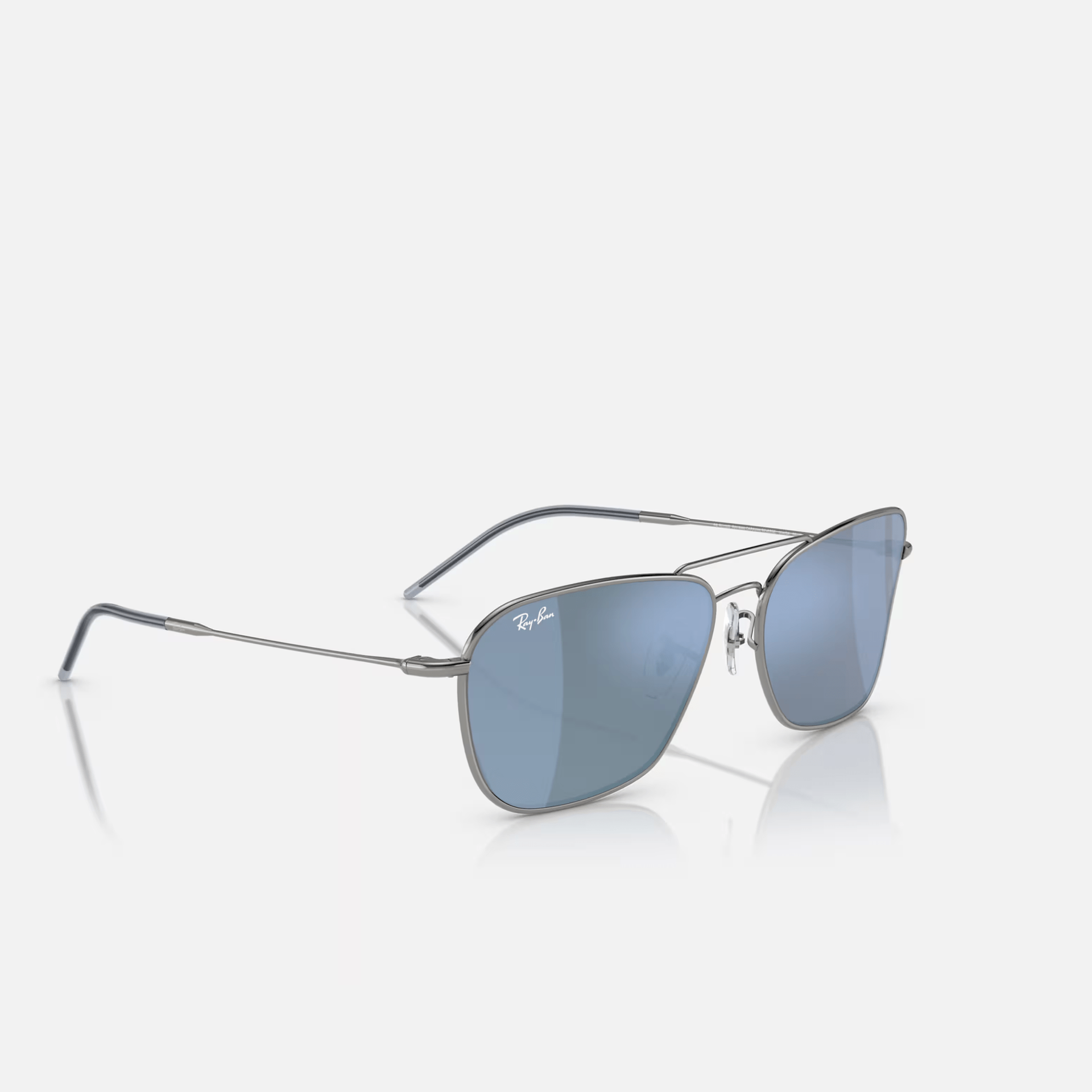 A pair of ray-ban sunglasses with blue lenses on a white background.