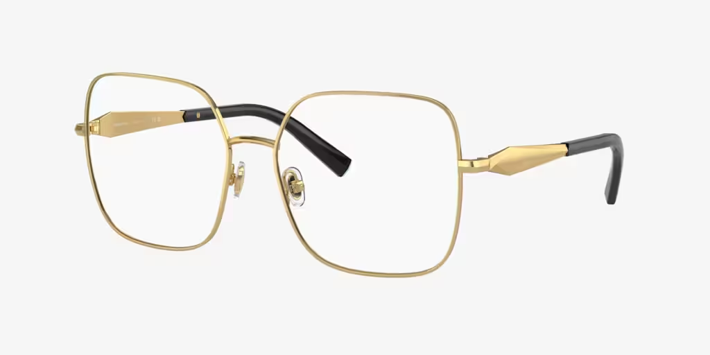 A pair of gold glasses on a white background.