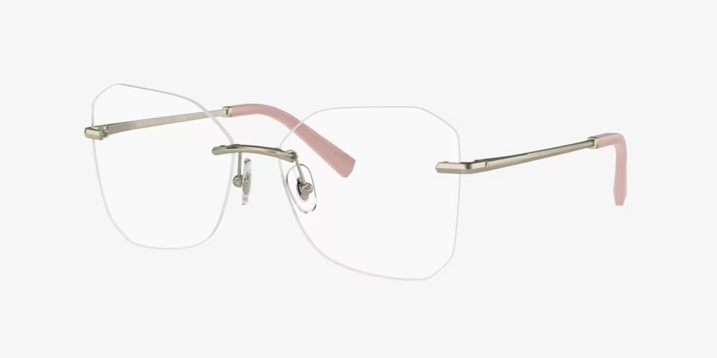 A pair of rimless glasses with pink arms on a white background.