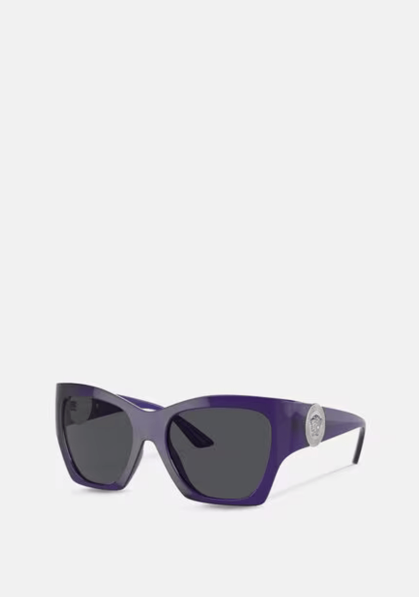 A pair of purple sunglasses on a white background.