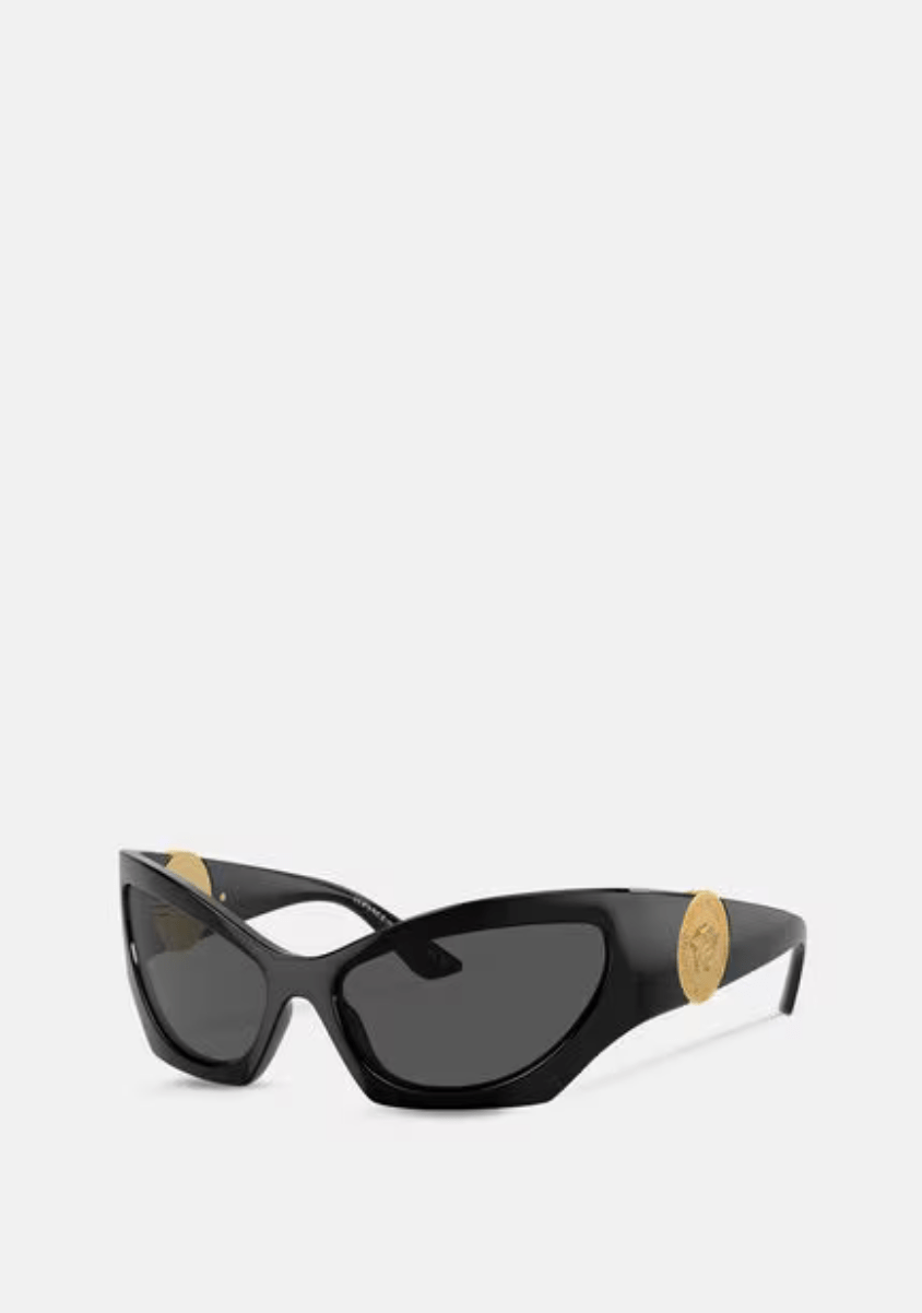 A pair of black versace sunglasses on a white background.