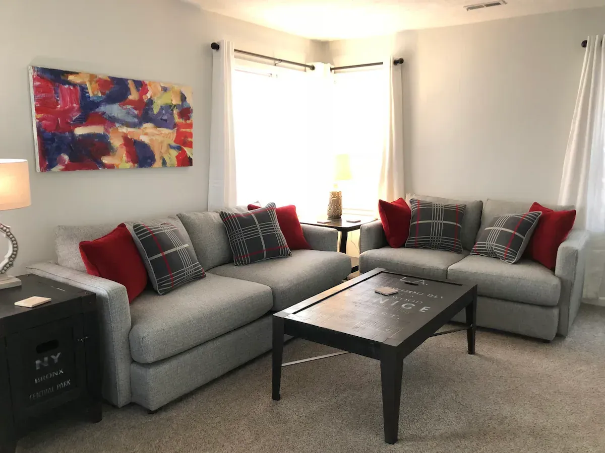 A living room with two couches and a coffee table