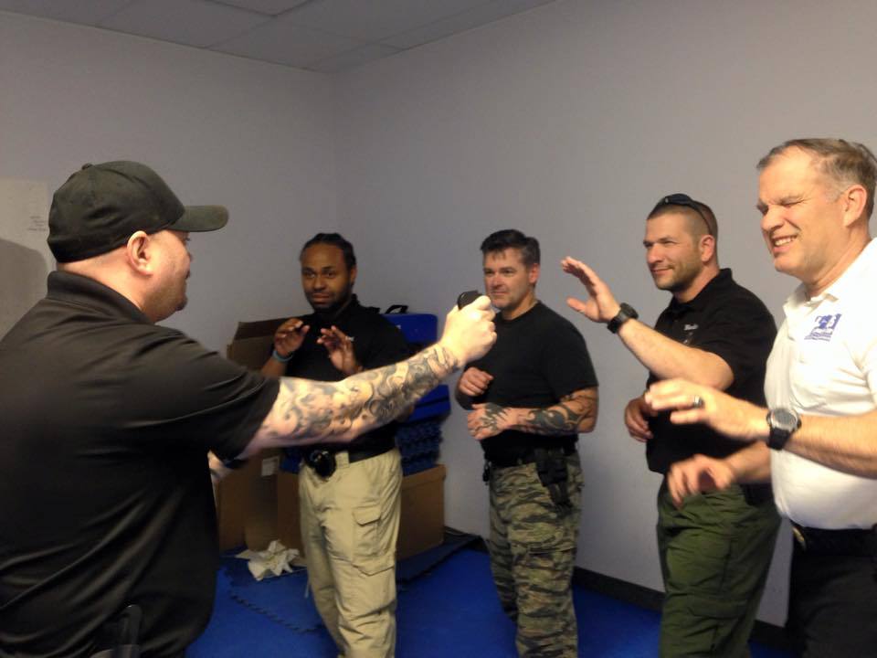 4 Men Engaged In Security Officer Training