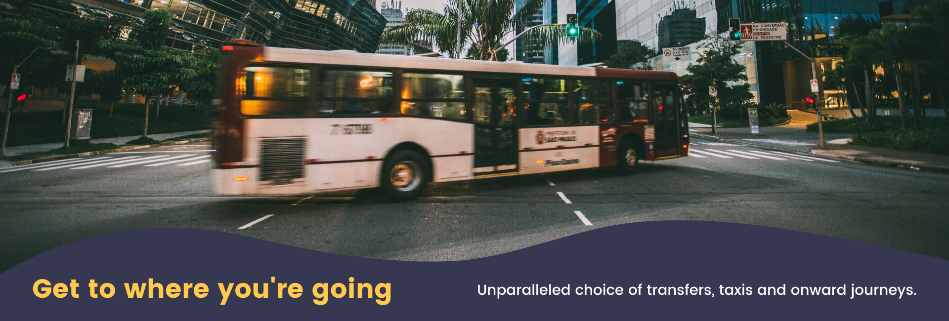 A bus is driving down a city street.