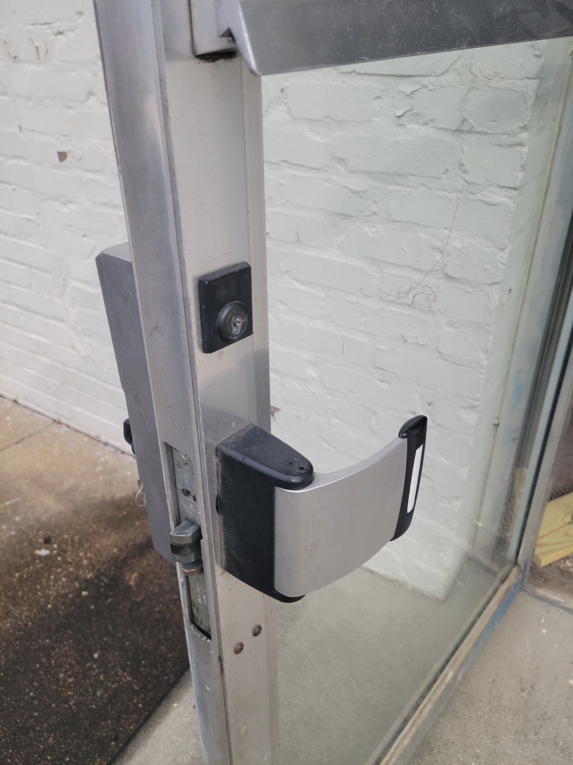 A close up of a door with a handle on it