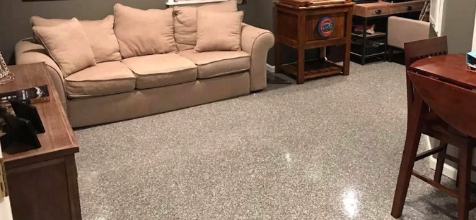 a living room with a couch , table and chairs .