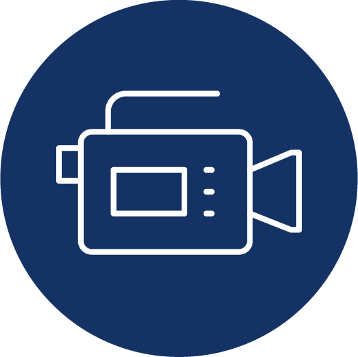 White outline of a video camera on a dark blue circle.