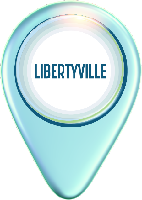 A light blue map pin icon containing the text