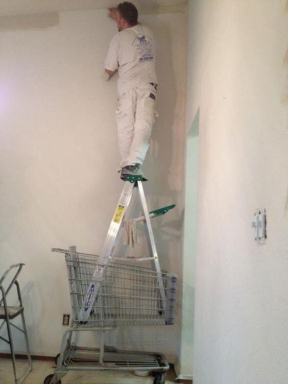 Man Painting the Wall — Chicago, IL — Bravura Facility Management, LLC