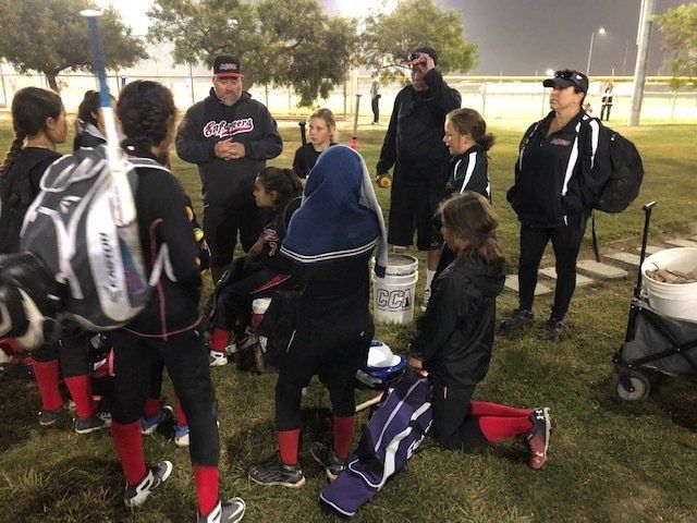 Coach Talking To Softball Players — Salinas, CA — TechPro Athletics