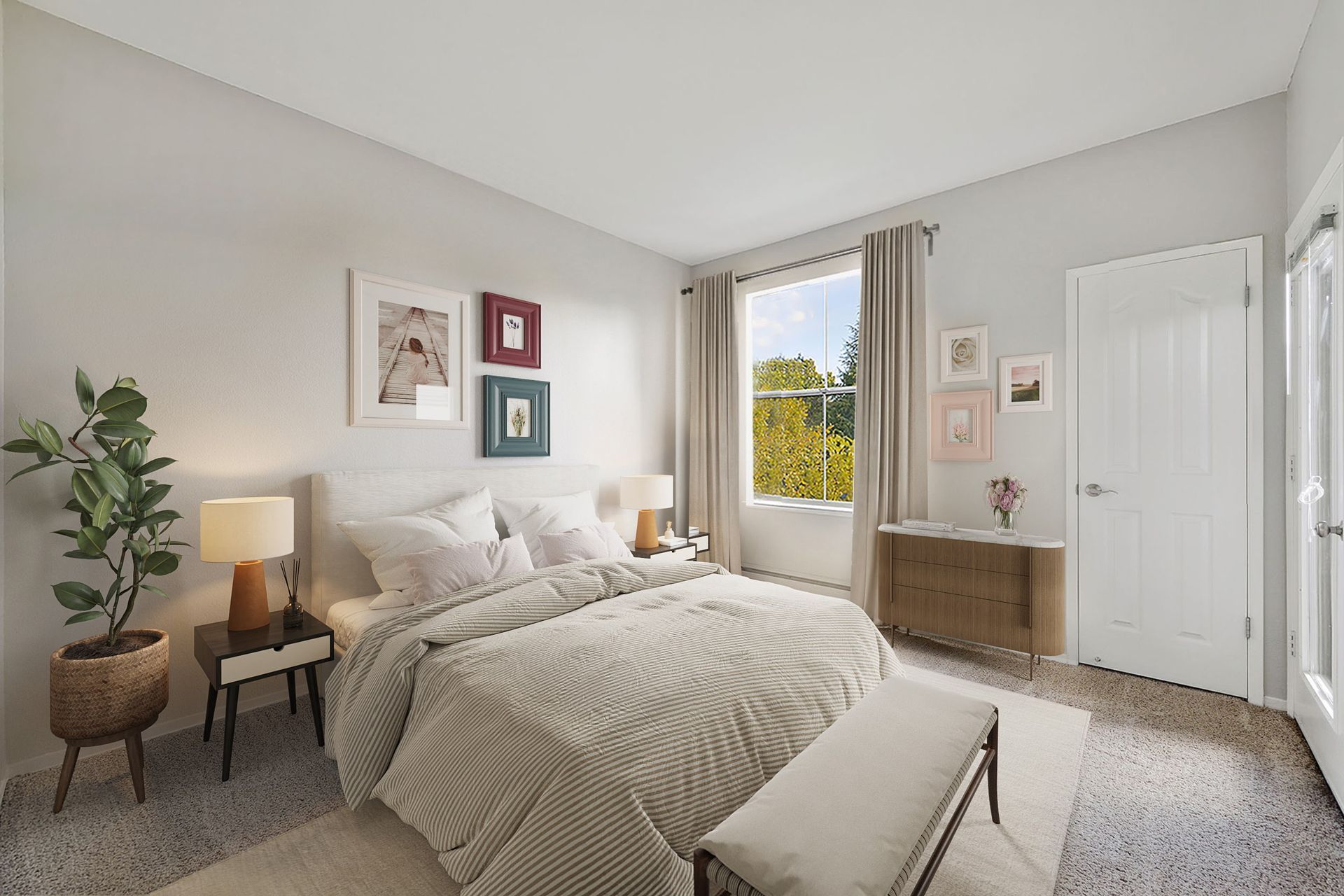 Bright bedroom in an apartment with a bed, nightstands, dresser, and large window.