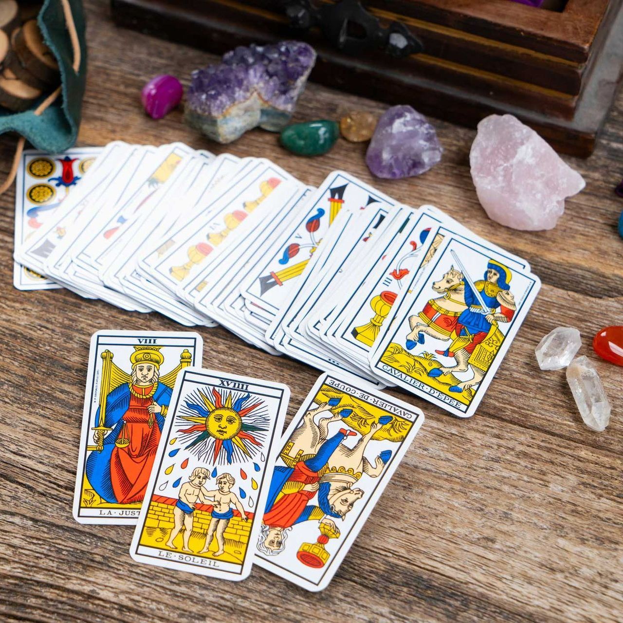 A deck of tarot cards on a wooden table