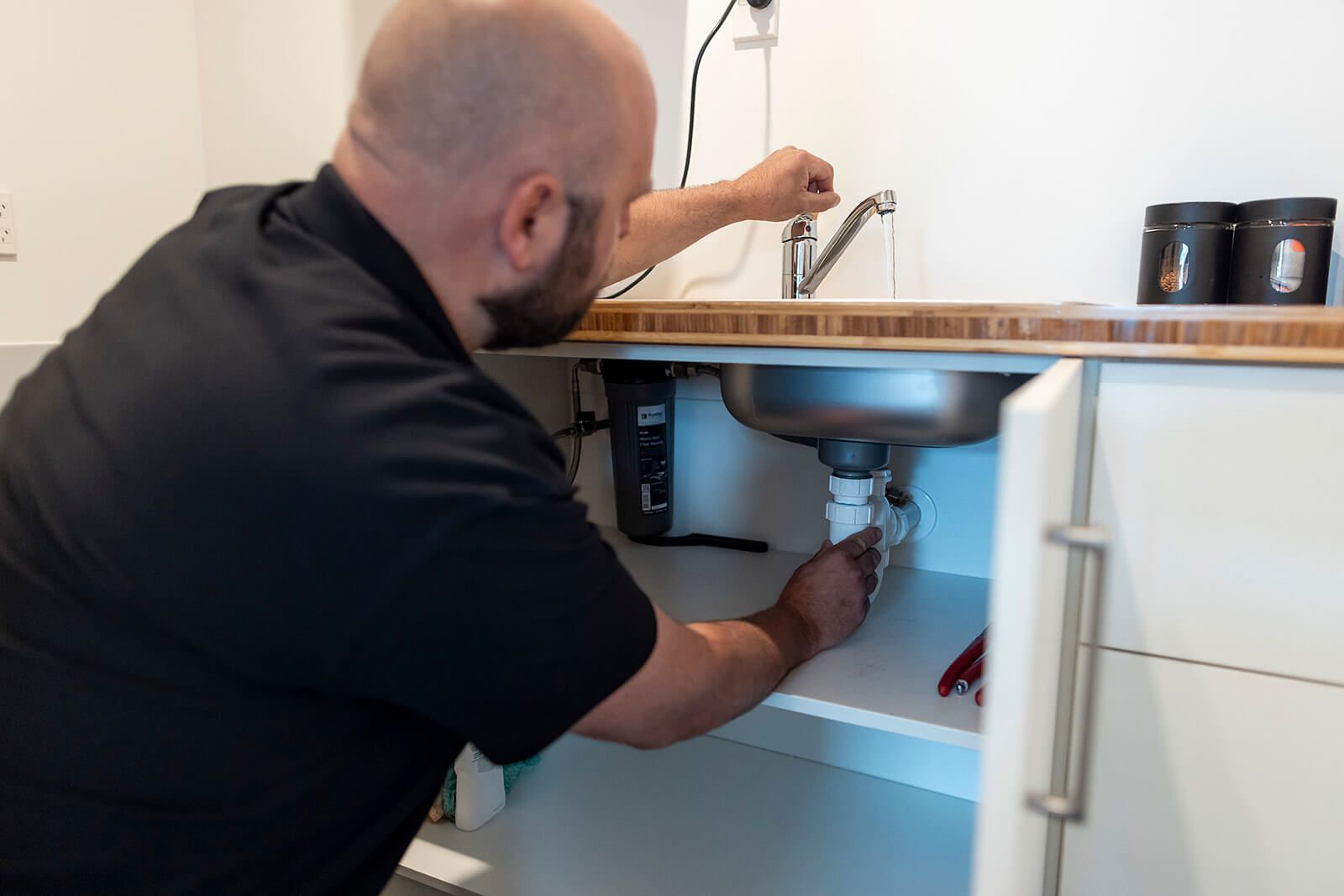 A garbage disposal with a filter attached to it