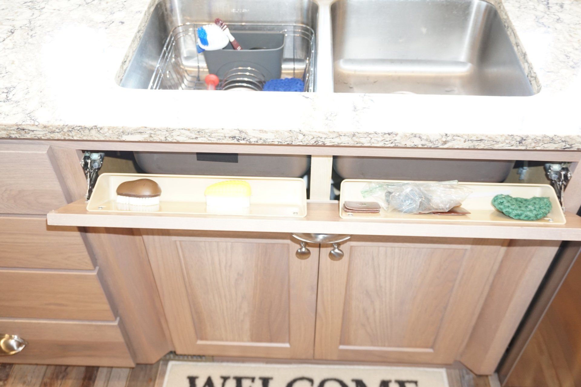 Tip-out drawer for kitchen sink.