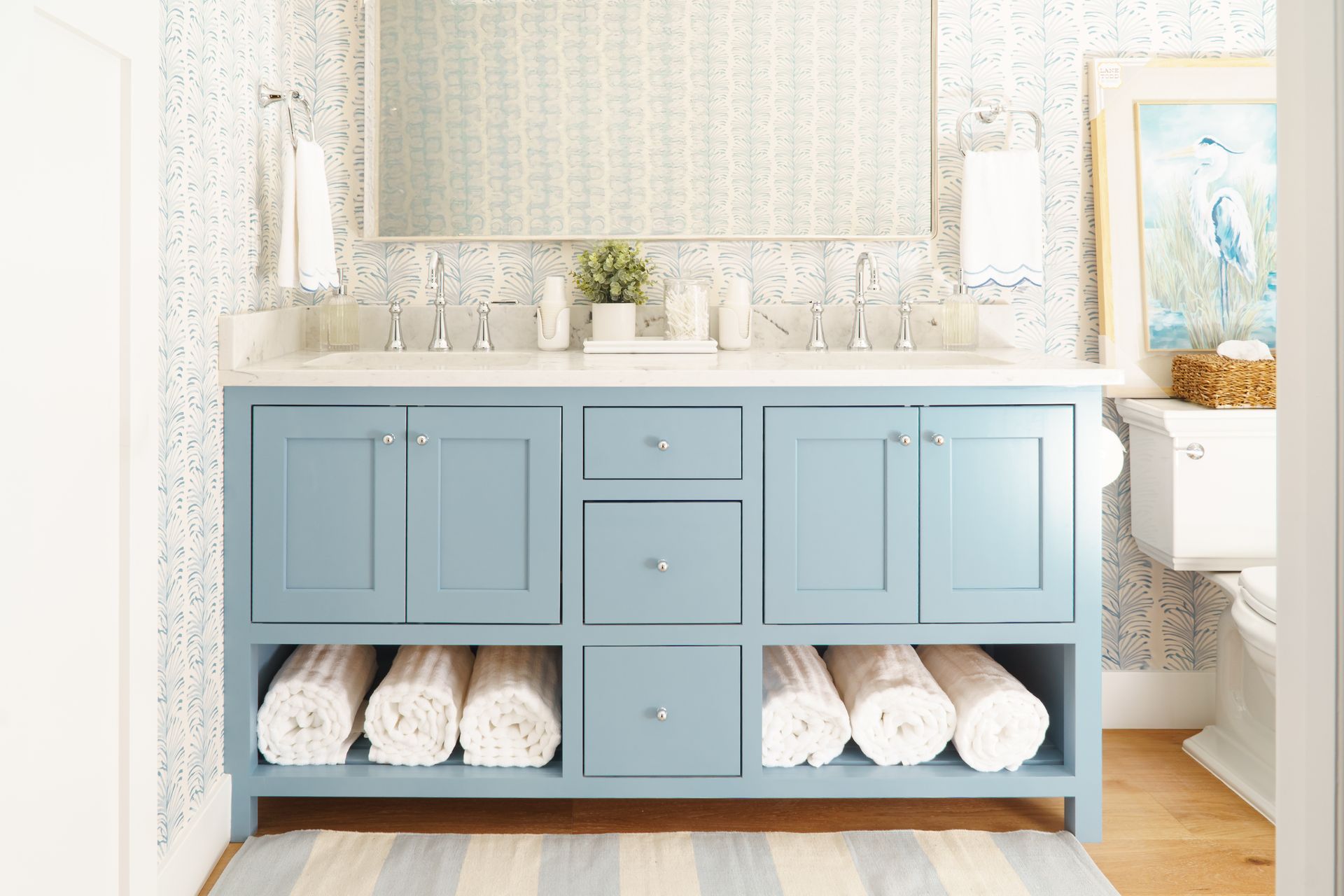 Custom bathroom vanity. Painted light blue, modern airy look.