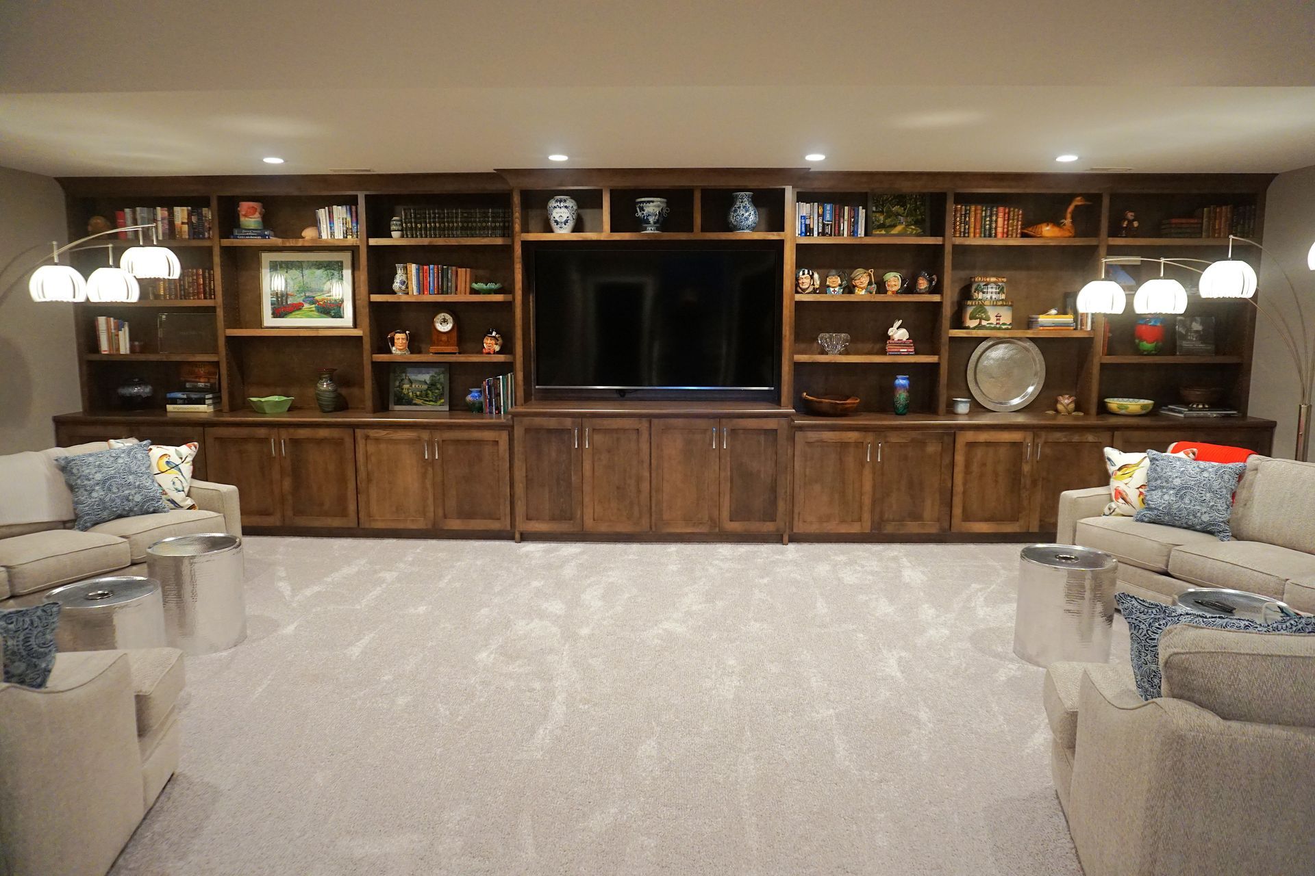 Custom stained wood entertainment center with shelves.