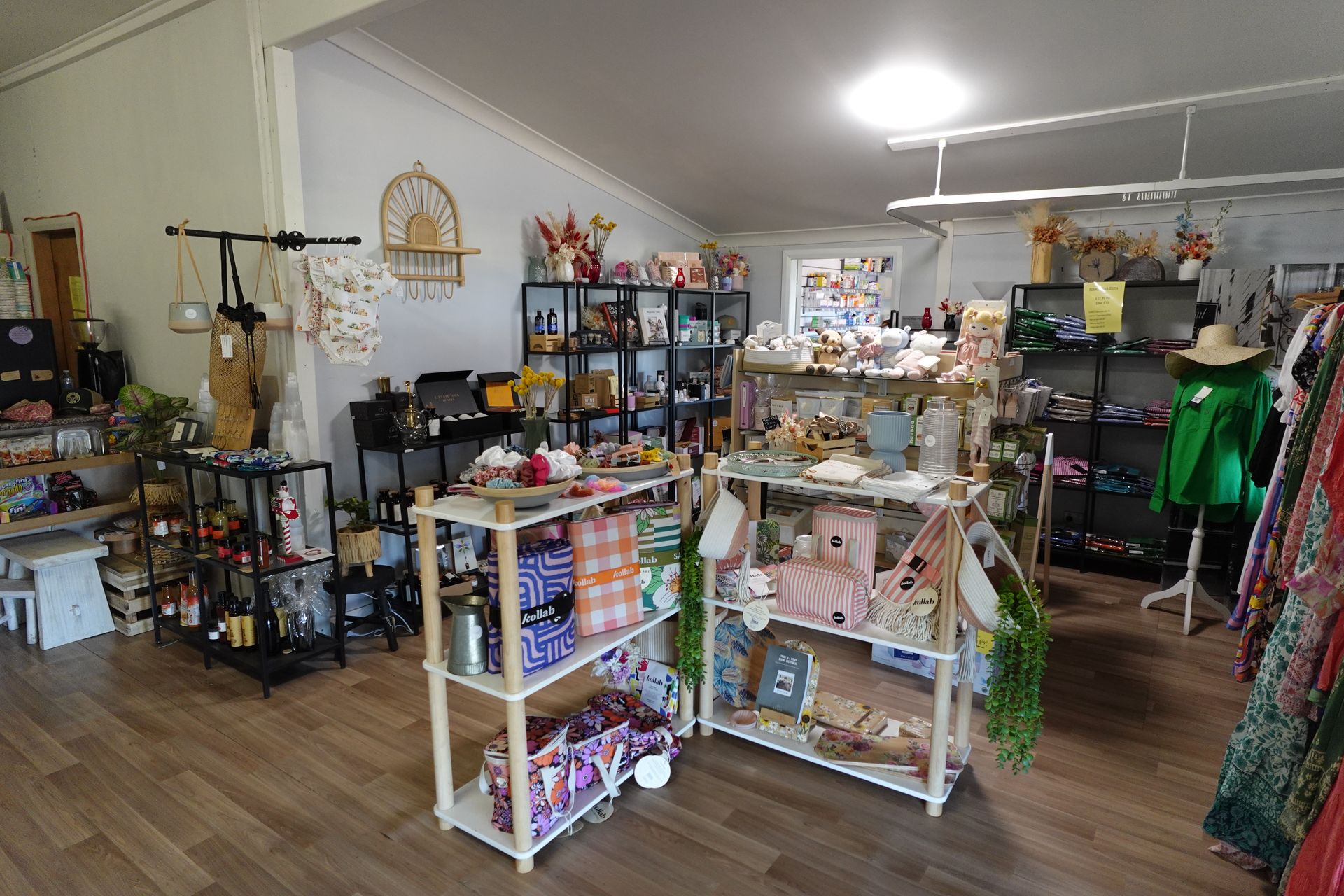 A store filled with lots of shelves and clothes on display.