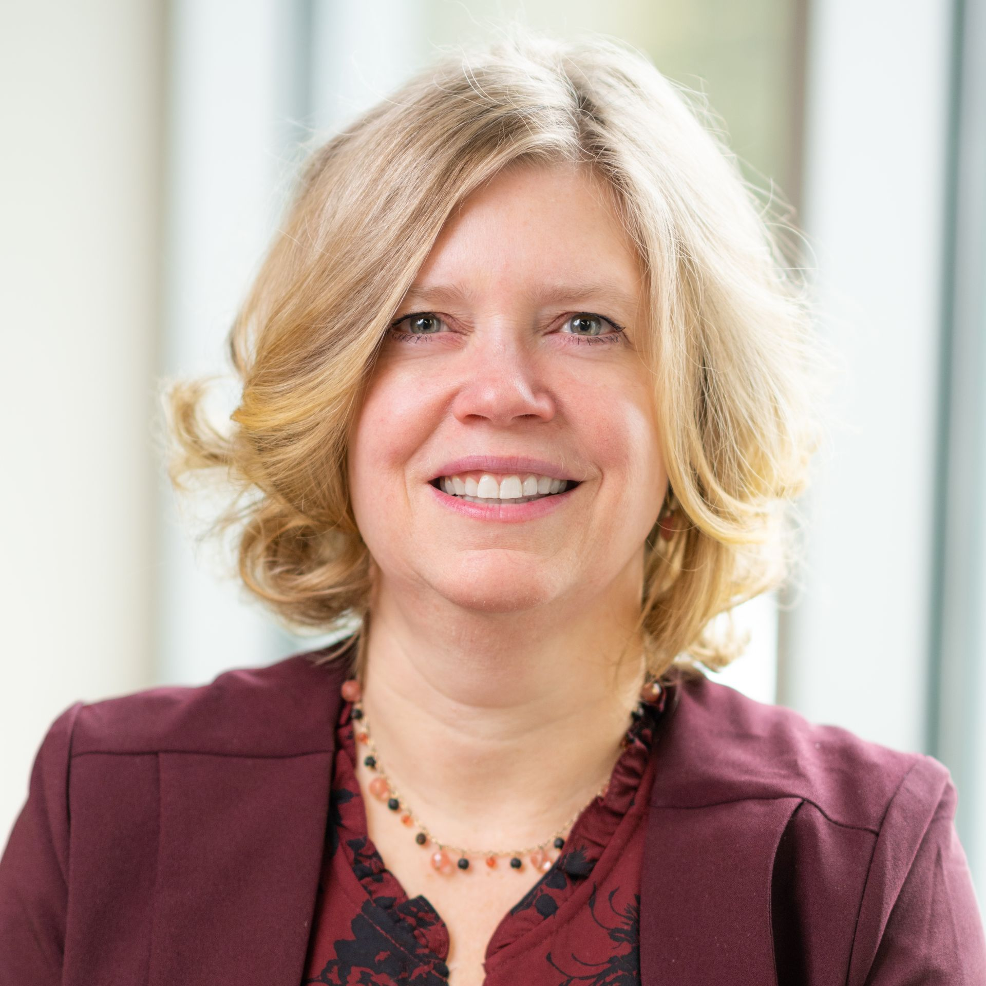 A woman smiling for the camera.