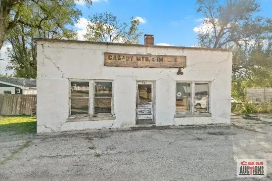 A pair of pliers and a screwdriver are on a table