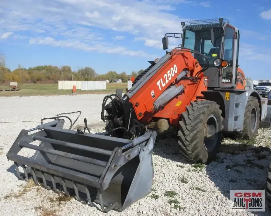 A pair of pliers and a screwdriver are on a table