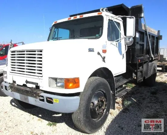 A bunch of hexagon shaped containers with cbm auctions written on the bottom