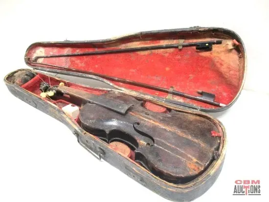 A pair of pliers and a screwdriver are on a table