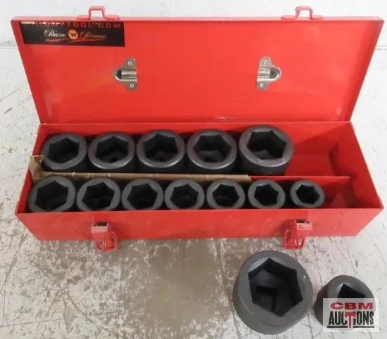 A red toolbox with a lot of sockets in it