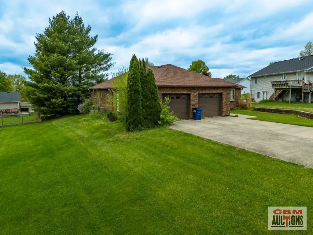 An aerial view of a house for sale by com auctions