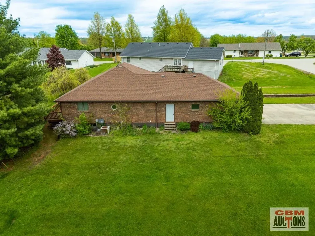 An aerial view of a house for sale by com auctions