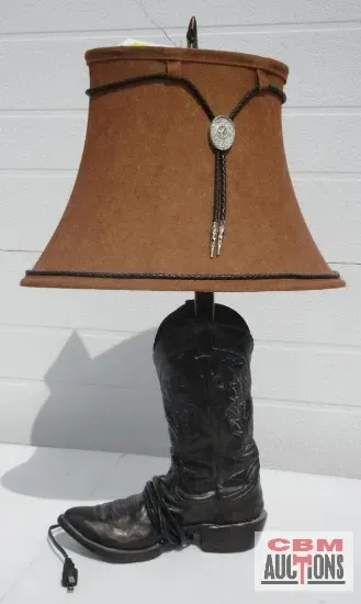 A lamp made out of a pair of cowboy boots