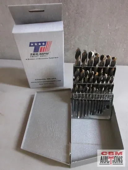 A set of drill bits in a box that says gsm auctions