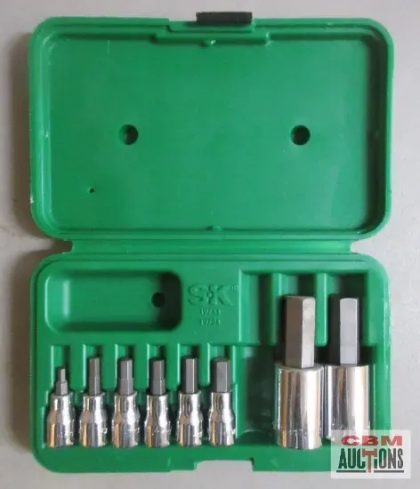 Green toolbox containing a set of SK brand hex bit sockets of varying sizes.