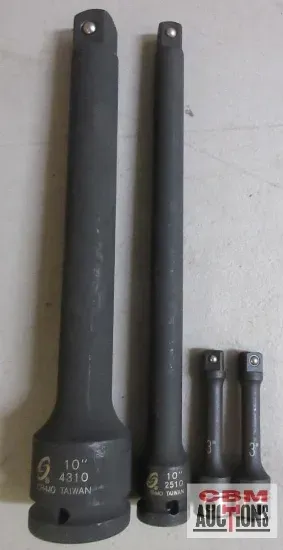 A couple of black sockets sitting on top of a table.