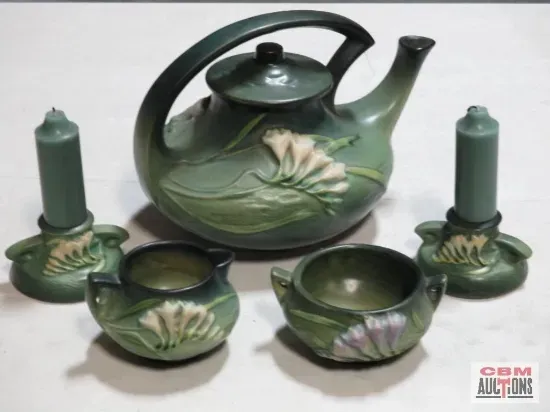 A bunch of hexagon shaped containers with cbm auctions written on the bottom