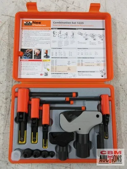 A set of tools in an orange case that says com auctions