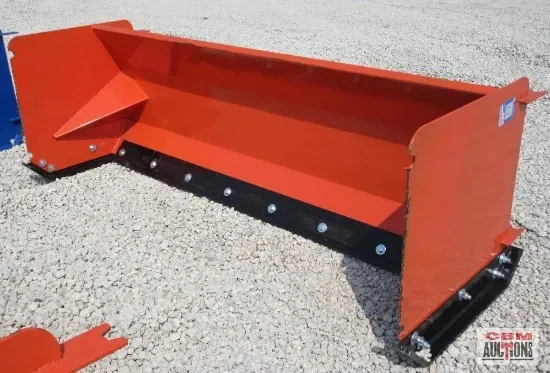 Orange snow pusher blade on gravel. Black wear bar bolted along the bottom.