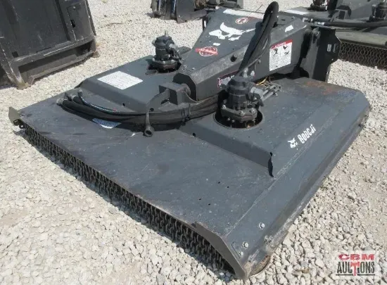 Bobcat brush cutter attachment, gray, for clearing vegetation.