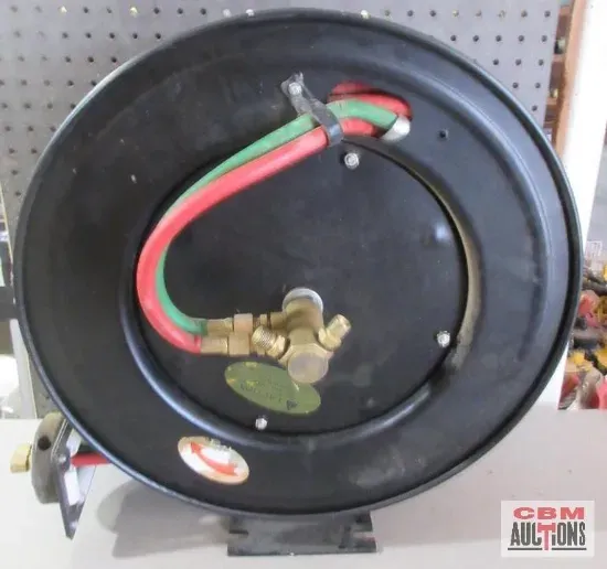 Damascus steel knife with wooden handle and leather sheath.