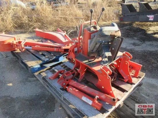 A yellow metal object with a hose attached to it
