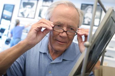 Man in an optical store - Eye Doctor in Holiday, FL