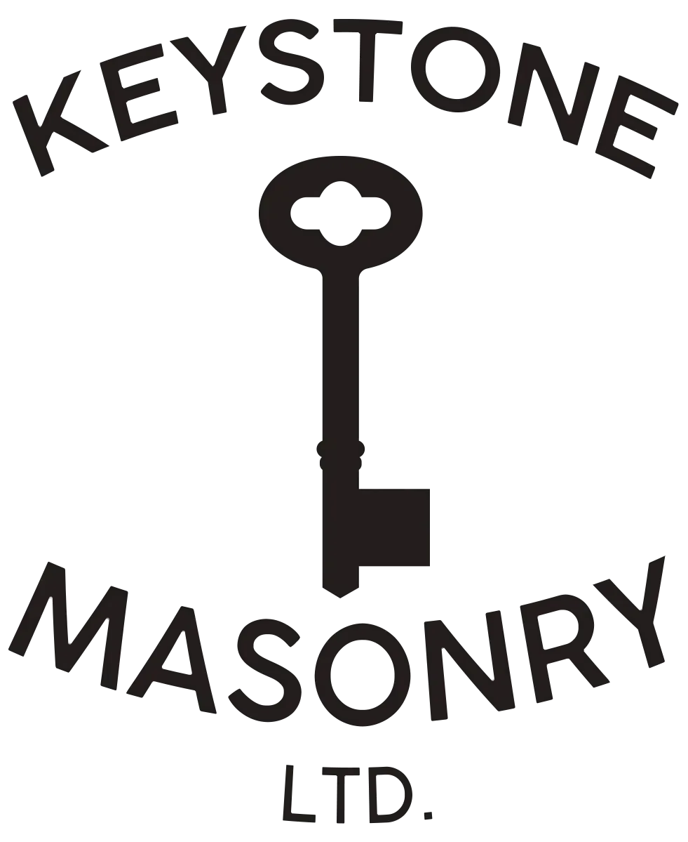 Logo for Keystone Masonry: Black key centered between the words "KEYSTONE" above and "MASONRY LTD." below.