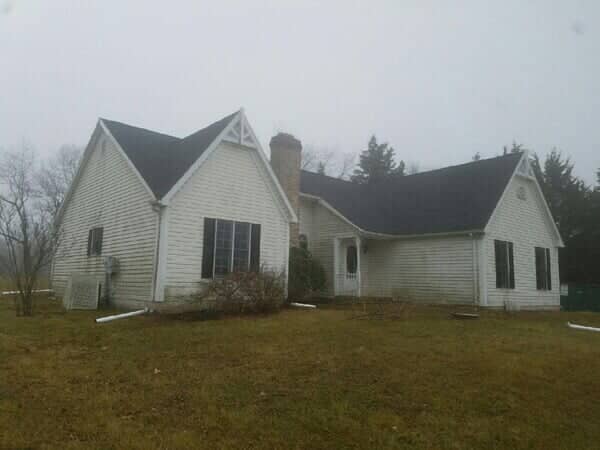 Home Exterior With New Roof And Siding — York, PA — Dallastown Roofing & Contracting