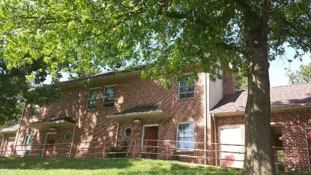 House With Brick Siding — York, PA — Dallastown Roofing & Contracting