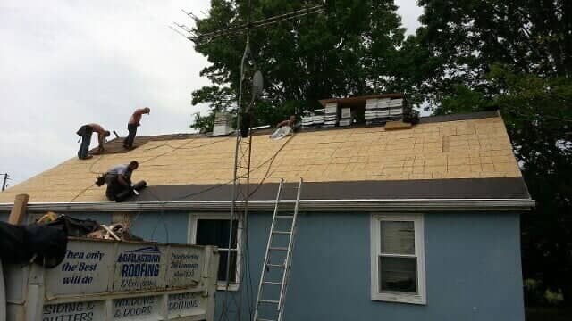 Men Installing New Roof — York, PA — Dallastown Roofing & Contracting