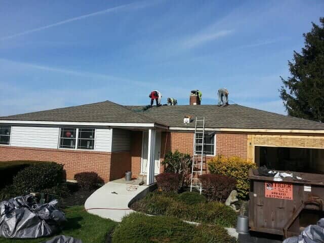Workers Fixing Roof Damage — York, PA — Dallastown Roofing & Contracting